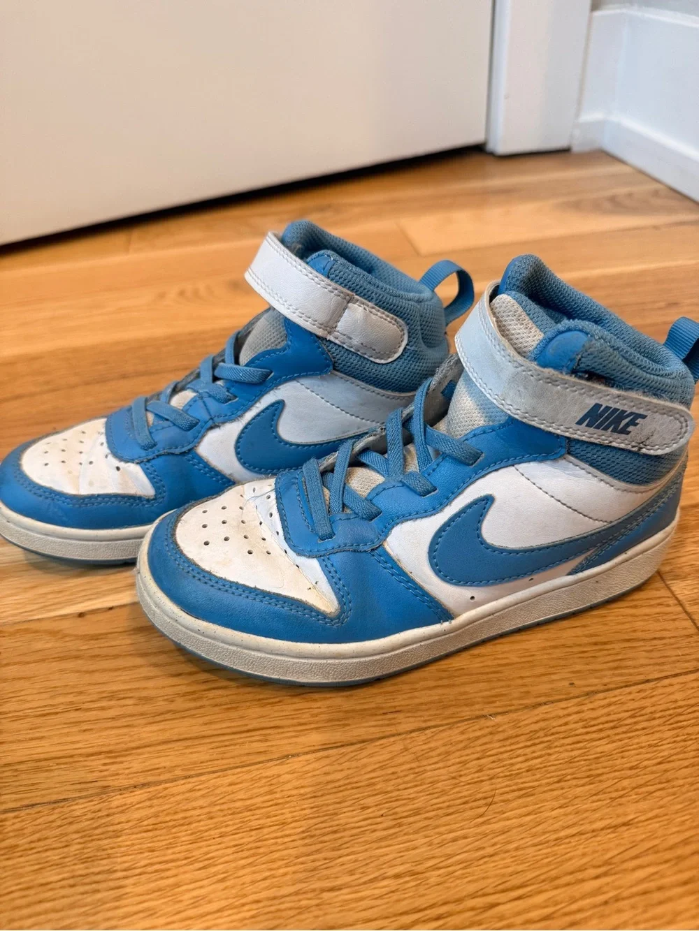 Nike Kids High-Top Sneakers in White and Blue